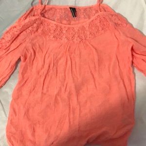 The brand is heart soul peach colored shirt